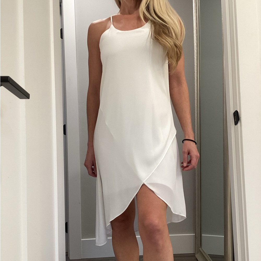Asymmetrical gauzy white racer back dress